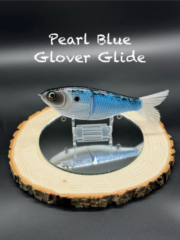 A vibrant blue and black fishing lure under the title "Pearl Blue Glover Glide".