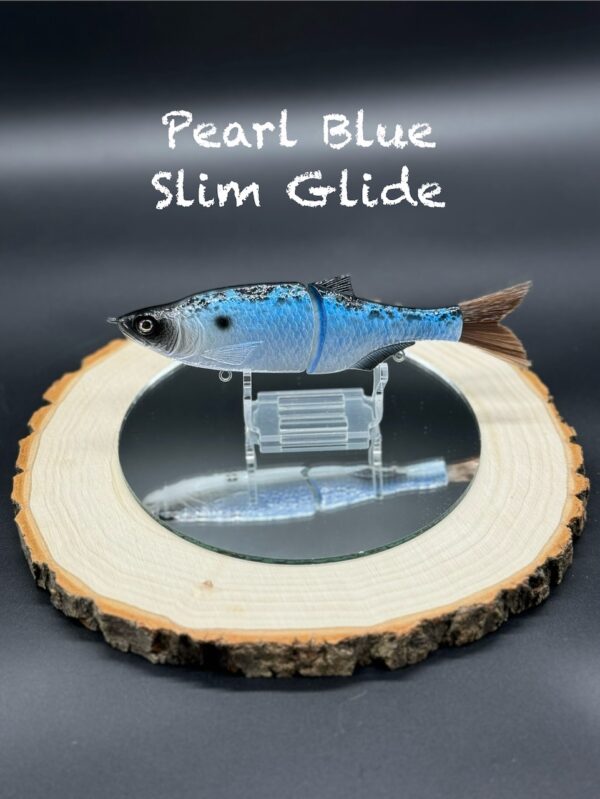 A vibrant blue and black fishing lure under the title "Pearl Blue Slim Glide".