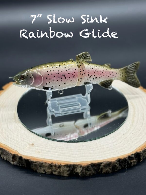 A green and light pink fishing lure under the title "7 inch Slow Sink Rainbow Glide".