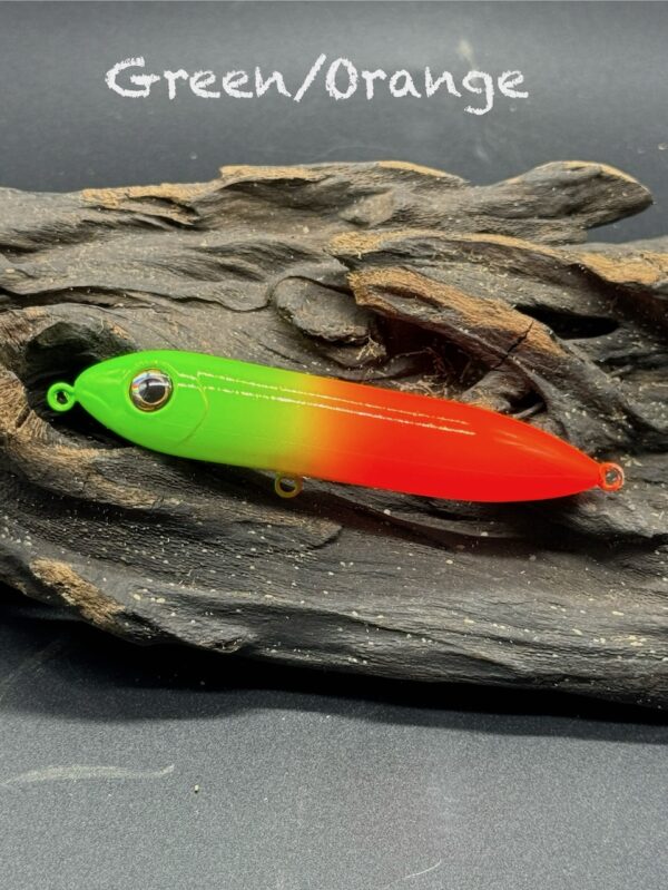 A neon green and orange sit or drift stick under the title "Green/Orange".