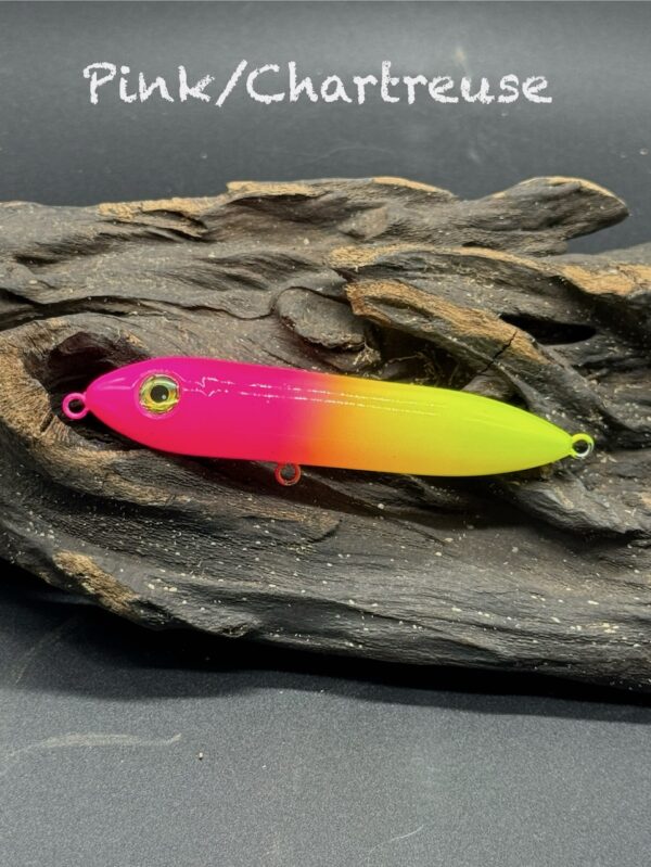 A hot pink and yellow sit or drift stick under the title "Pink/Chartreuse".