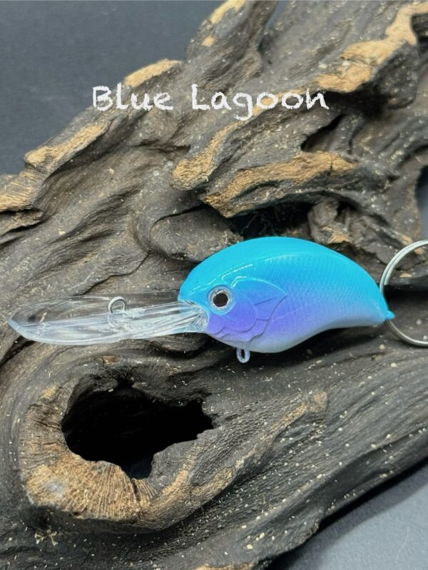 A squarebill lure painted bright blue with a purple side and white belly.