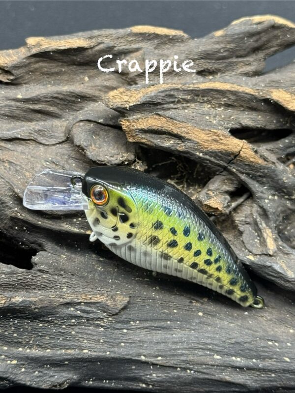 A squarebill lure painted green and yellow with black speckles.