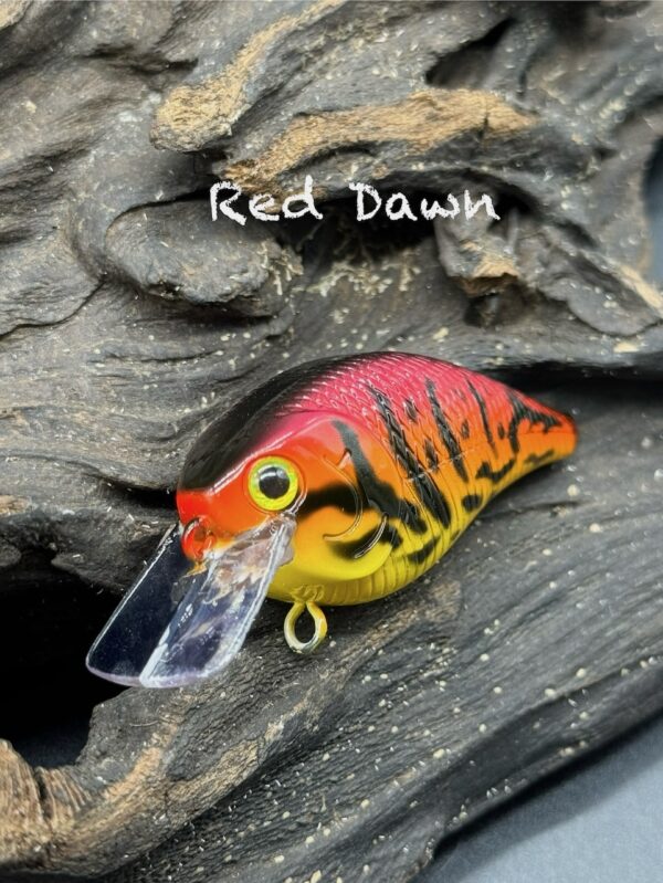 A squarebill lure with a red/orange/yellow gradient and black back and markings under the title "Red Dawn".