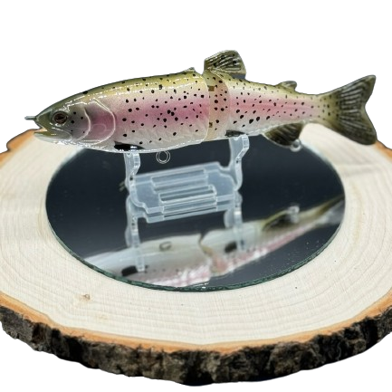 A green and light pink fishing lure.