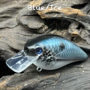 A squarebill lure under the title "Blue/Ice" painted light blue with a black back and white belly and black used to outline the scales.