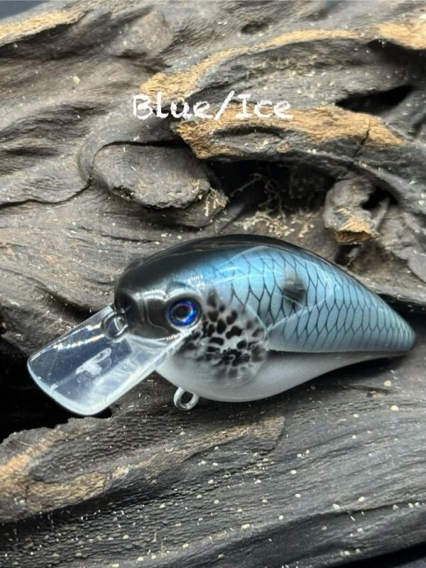 A squarebill lure under the title "Blue/Ice" painted light blue with a black back and white belly and black used to outline the scales.