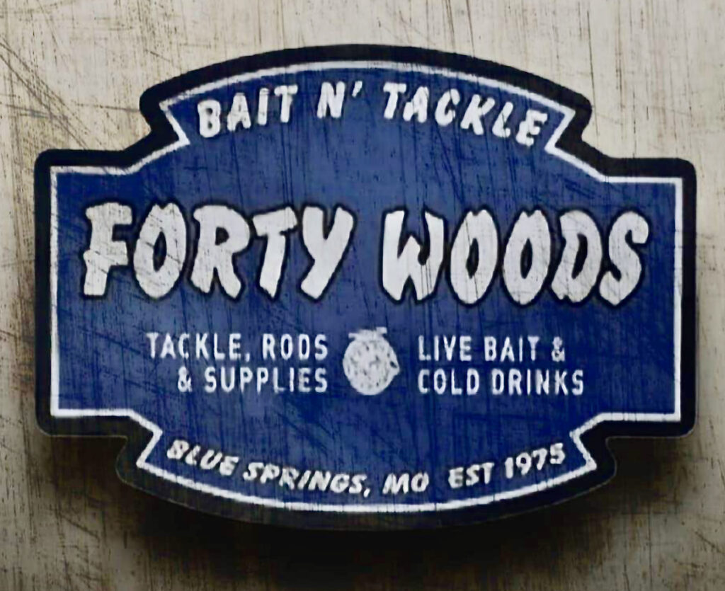 Forty Woods logo on wood.